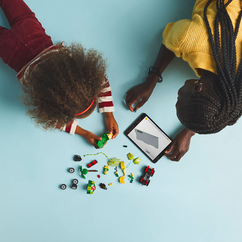 Spin y Electro: Duelo de Vehículos Dinosaurio